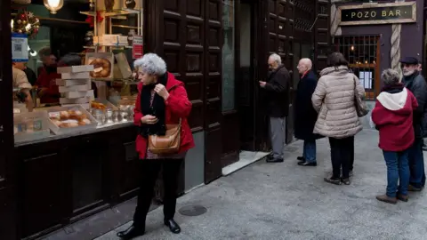 Getty Images Shoppers in Madrid