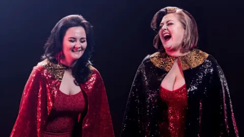 Drew Forsyth Kiri and Rachel on stage