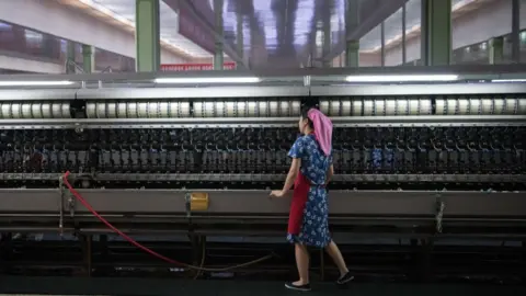 Carl Court A woman works in the Kim Jong Suk Silk Factory on August 21, 2018 in Pyongyang, North Korea