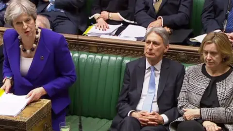 AFP Theresa May, Philip Hammond and Amber Rudd