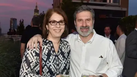 Getty Images Chris Morvillo poses with his wife Nada in New York in 2018