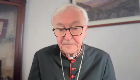 Cardinal Vincent Nichols looks at the camera.