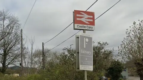 The sign for castle Cary station