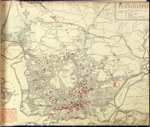 The Box Plymouth A picture of the Blitz book. It is a detailed bomb map of Plymouth with the red dots indicating where they were dropped.