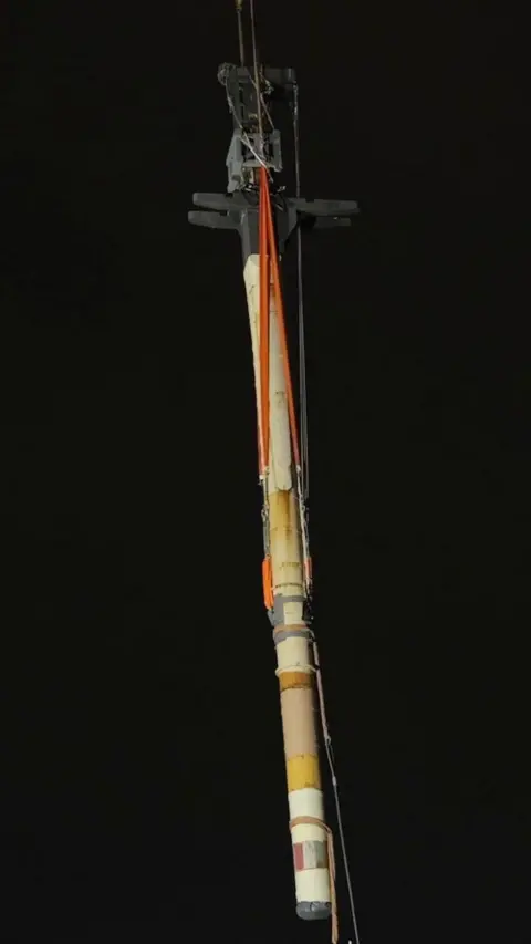 The mast from HMS Victory suspended in the air