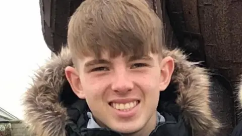 Surrey Police Photo of Charlie Hopkins smiling