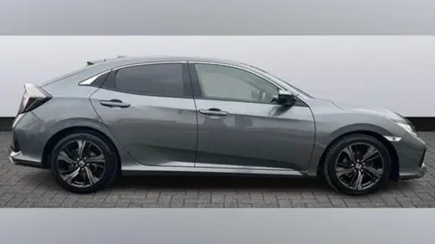 Merseyside Police A side view of a generic dark silver Honda Civic