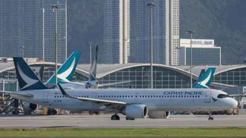 Reuters A Cathay Pacific flight taxis at Hong Kong International Airport 