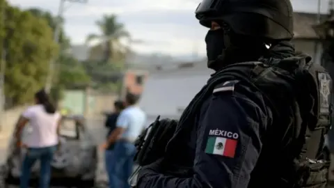 AFP/Getty Images A Mexican police officer. File photo