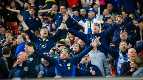 SNS Scotland fans in the crowd during the match against Greece in Athens.