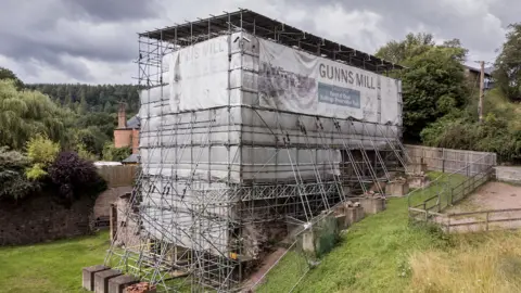 Historic England Gunns Mill under scaffolding