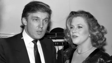 Getty Images Businessman Donald Trump chats with actress Kathleen Turner at the D W Girffith Awards At Lincoln Center Library in February 1988