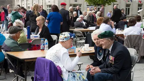 Getty Images VE Day 70th Anniversary Party in the Guildhall Square Southampton UK 09 May 2015 A Royal Navy Commando veteran enjoying the party.