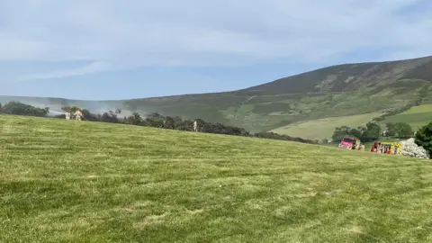 IOM Fire and Rescue Service Fire crews tackling fire in Greeba