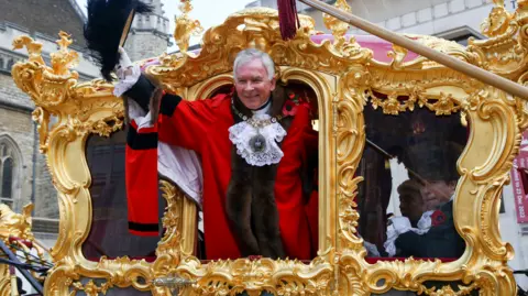 Getty Images Nicholas Lyons, the new Lord Mayor of London seen in the state carriage at the Guildhall Yard, during the Lord Mayor Show