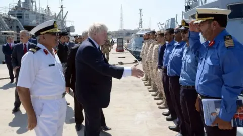 PA Boris Johnson meets members of the Libyan coastguard