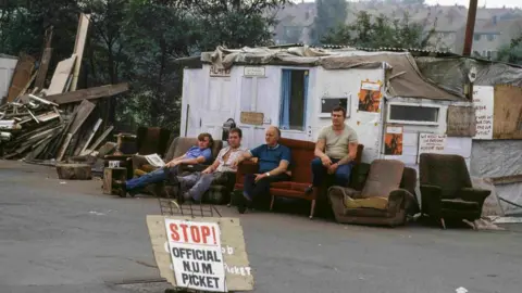 Getty Images Miners picketing at Cortonwood colliery