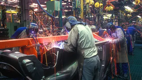 Getty Images Factory workers