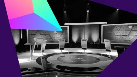 A stylised image in black and white of the empty debate set