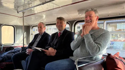David Henwood, Andrew Gant and Ian Loader all sat next to one another on the bus.