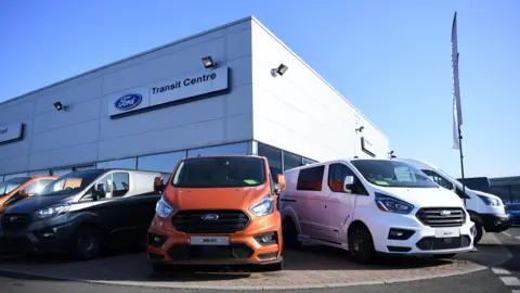 ANDY RAIN/EPA-EFE/REX/Shutterstock Ford vehicles astatine  a Ford Transit centre successful  London, Britain, 14 February 2023