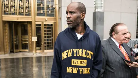 Getty Images DMX with his lawyer outside court in July