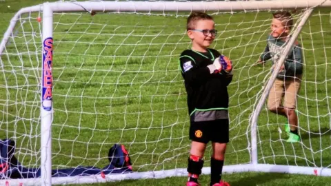 Family photo Jac in goal