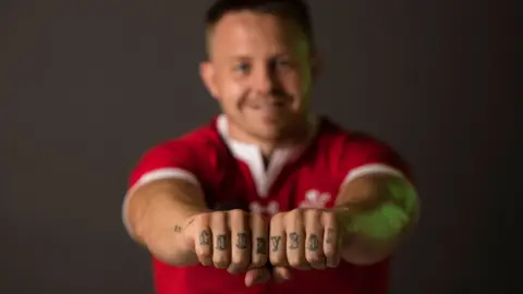 Getty Images Tattoos on James Davies' hands