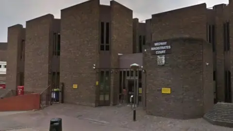 Google The outside of Medwa Magistrates Court, a brown brick building.