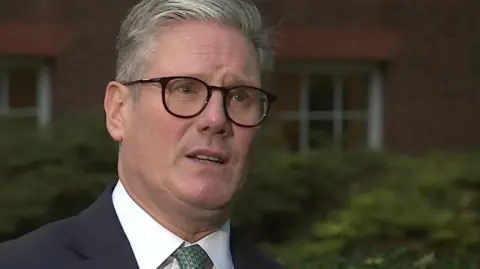 BBC Kier Starmer in a suit with a furrowed brow, pictured mid-sentence