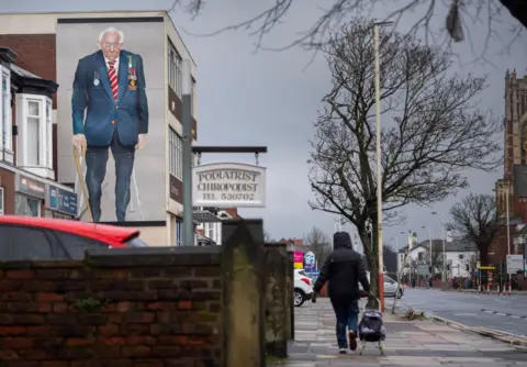 Getty Images A mural of Capt Sir Tom in Southport