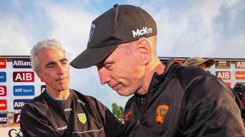 Jim McGuinness and Kieran McGeeney after the game