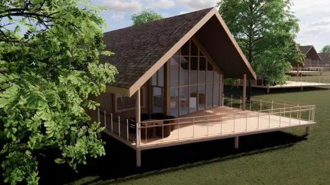 Kids' Village An artist's impression of one of the lodges at the site. It has a wide outside area which is raised, large glass doors and windows and a slanted roof. It is surrounded by trees and has another lodge in the background. The lodges are spaced apart.