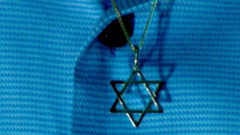 Star of David on a doctor's shirt