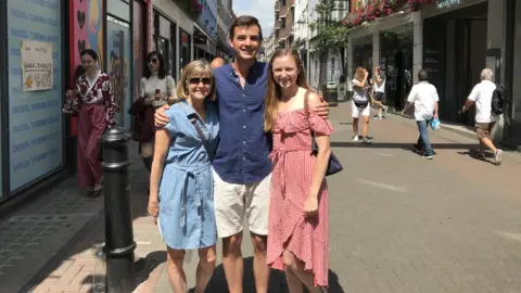 Joy Smith, Reilly Smith and Seth Smitherman on London's Carnaby Street