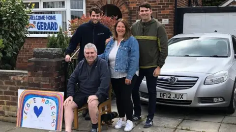 NHS Gerard Small with family