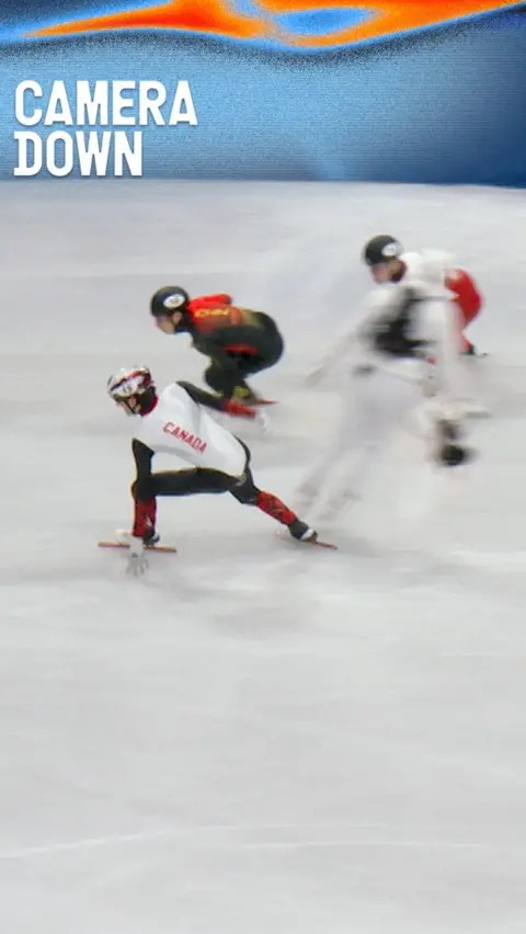 Speed skater collides with camera operator