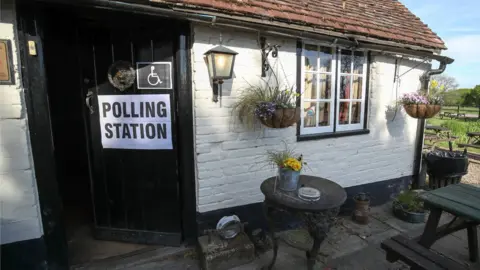 PA General view of the polling station at the White Horse Inn in Priors Dean, Hampshire, also known by locals as the "Pub with no name", as voters headed to the polls for council and mayoral elections across England and Northern Ireland.