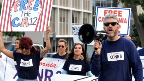 California Innocence Project Justin marches with supporters