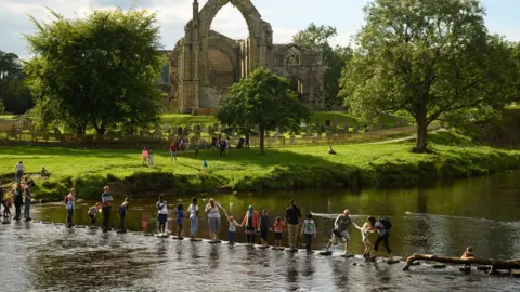 OLI SCARFF/Getty Images Stepping stones at Bolton Abbey in North Yorkshire