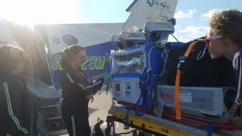 Adam Winch Axle Winch being airlifted