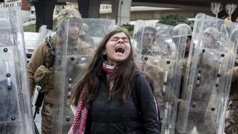 Getty Images A protester takes part in anti-government demonstrators in Beirut, Lebanon, 11 February 2020