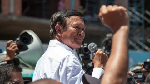 Getty Images Kem Sokha gives a speech to supporters in July 2014