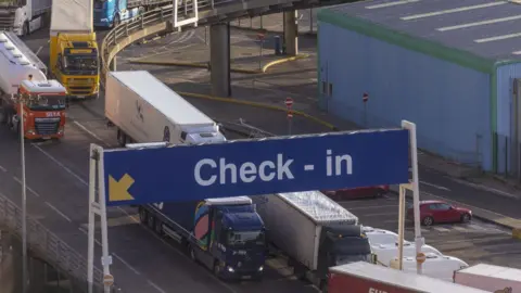 Getty Images Trucks arrive at the Port of Dover.