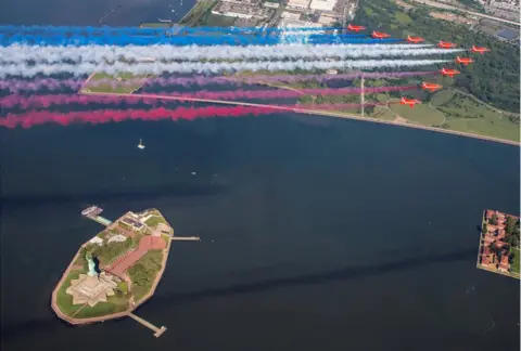 Royal Air Force The Red Arrows fly over the Statue of Liberty in New York City