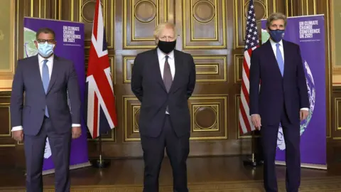 No 10 Downing Street Prime Minister Boris Johnson Meeting with United States Special Presidential Envoy for Climate John Kerry and COP26 President, Alok Sharma in the FCDO