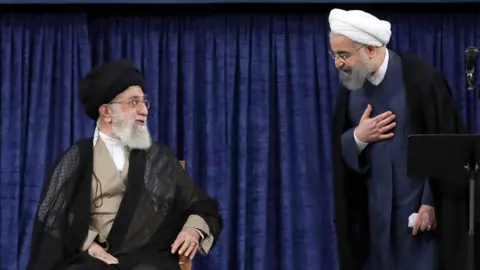 AFP/Getty Supreme Leader Khamenei (L) and Rouhani (R)