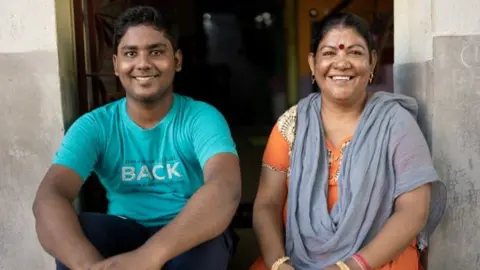 Jaltson Akkanath Chummar/BBC Tsunami with his mother Mounitha