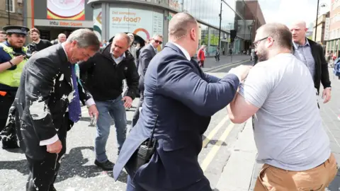 Reuters Nigel Farage hit by milkshake in Newcastle