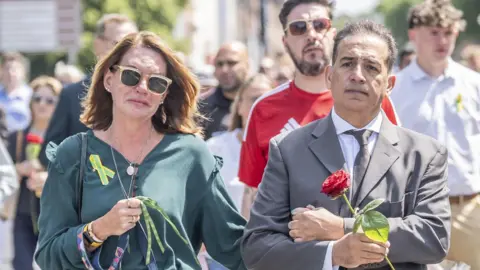 Danny Lawson/PA Wire Emma Webber and Dr Sanjoy Kumar
